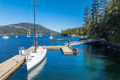 Sailboat at a private dock in a protected Salt Spring Island harbour
